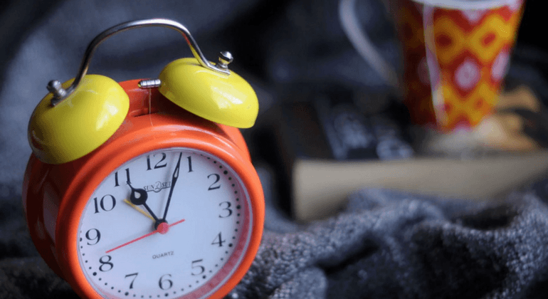 Orange and yellow alarm clock